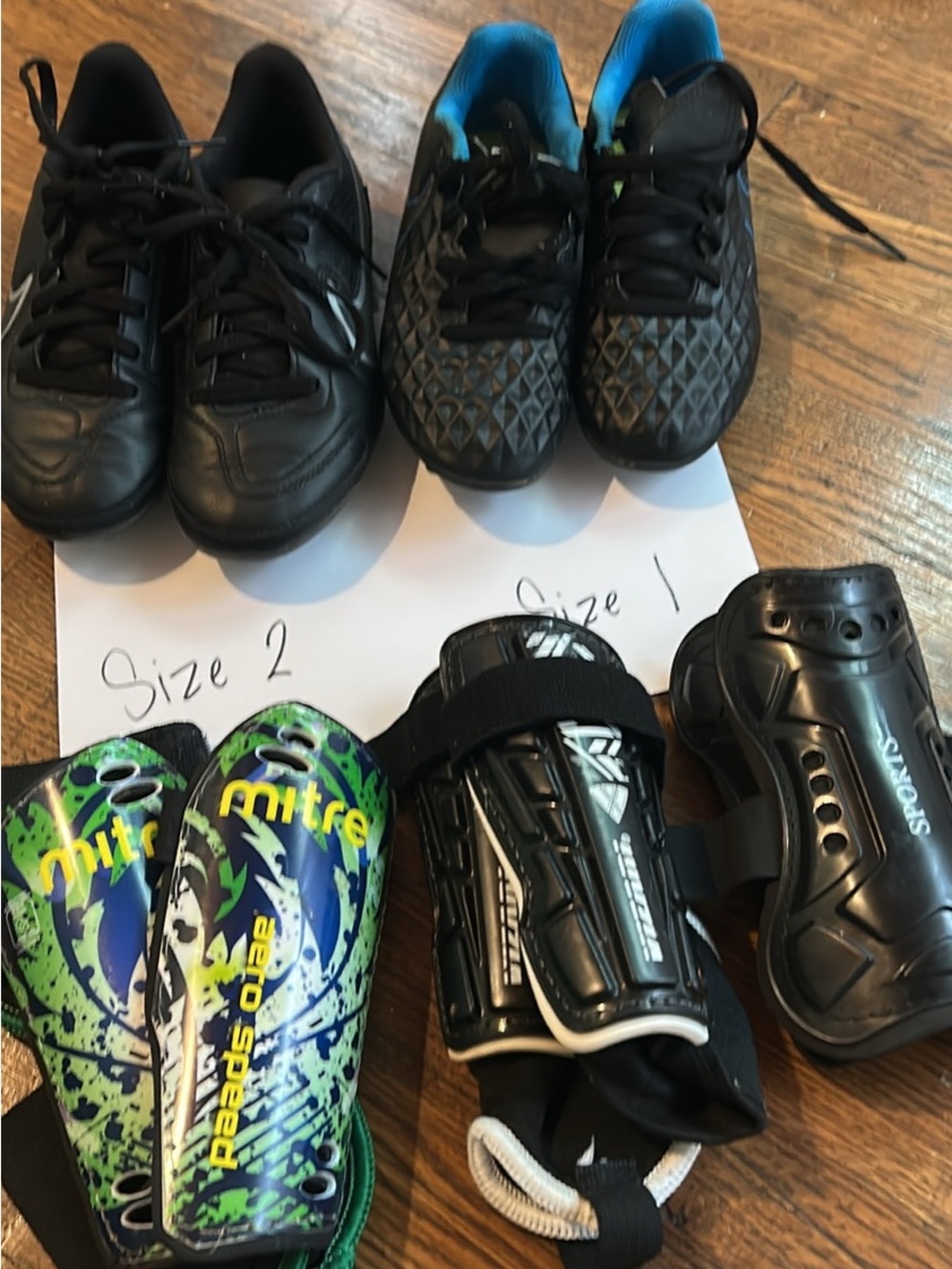 TWO pair! Nike Soccer Cleats & 3 pair shin guards